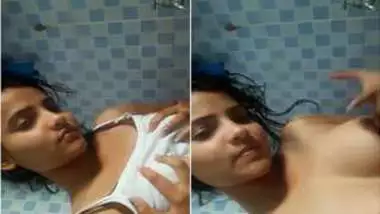 Lovely Indian debunks XXX boobs and greedily touches them in porn video